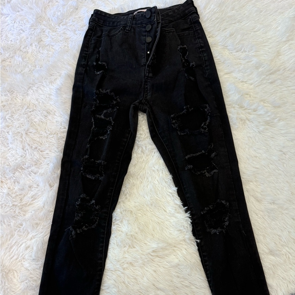 Black stretch ripped jeans